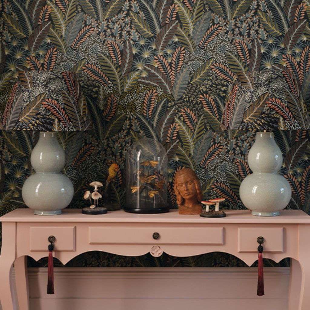 Romo wallpaper with botanical pattern and elegant table lamps, featuring unique decor pieces.