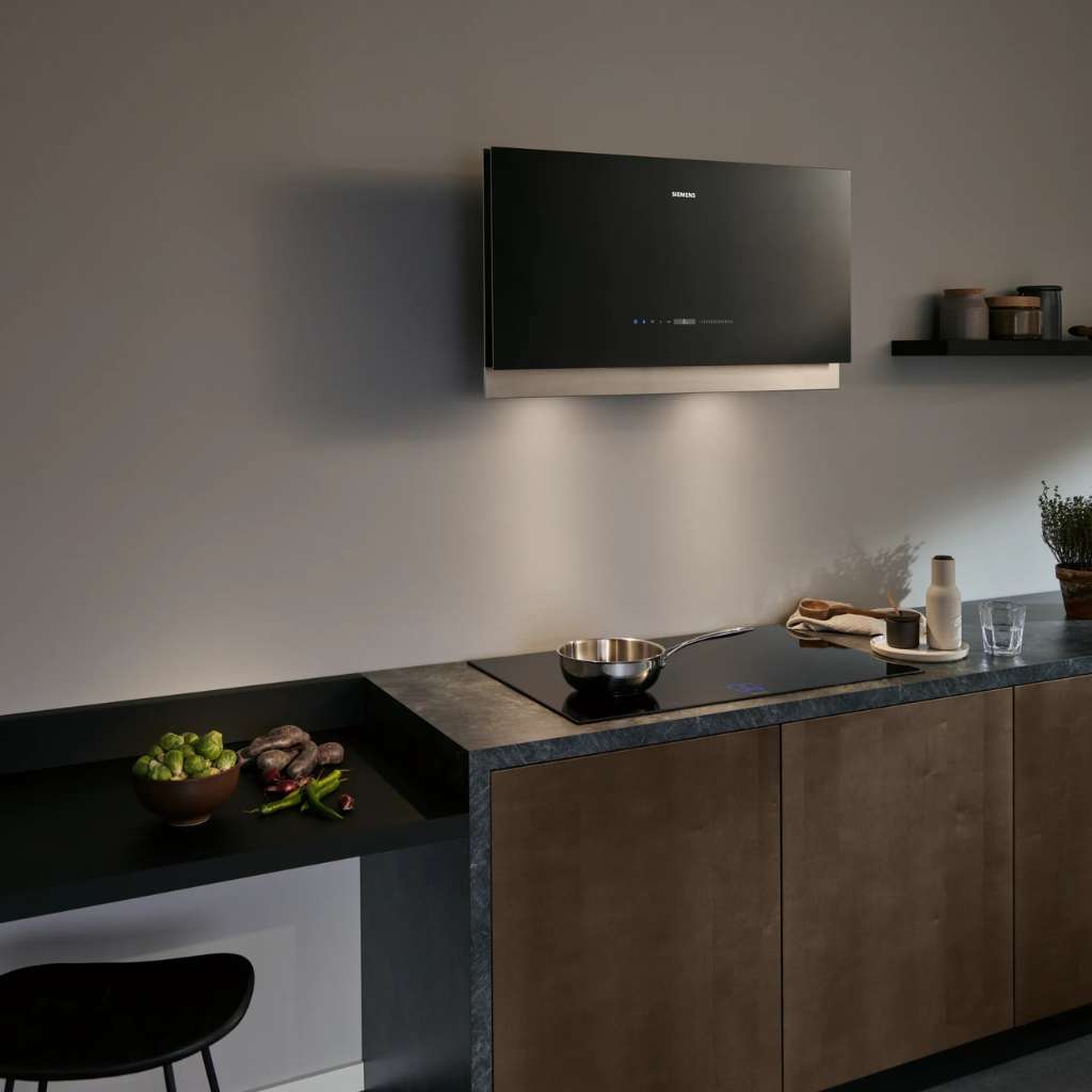 Siemens kitchen with dark cabinets, cooktop, and a minimalist design.