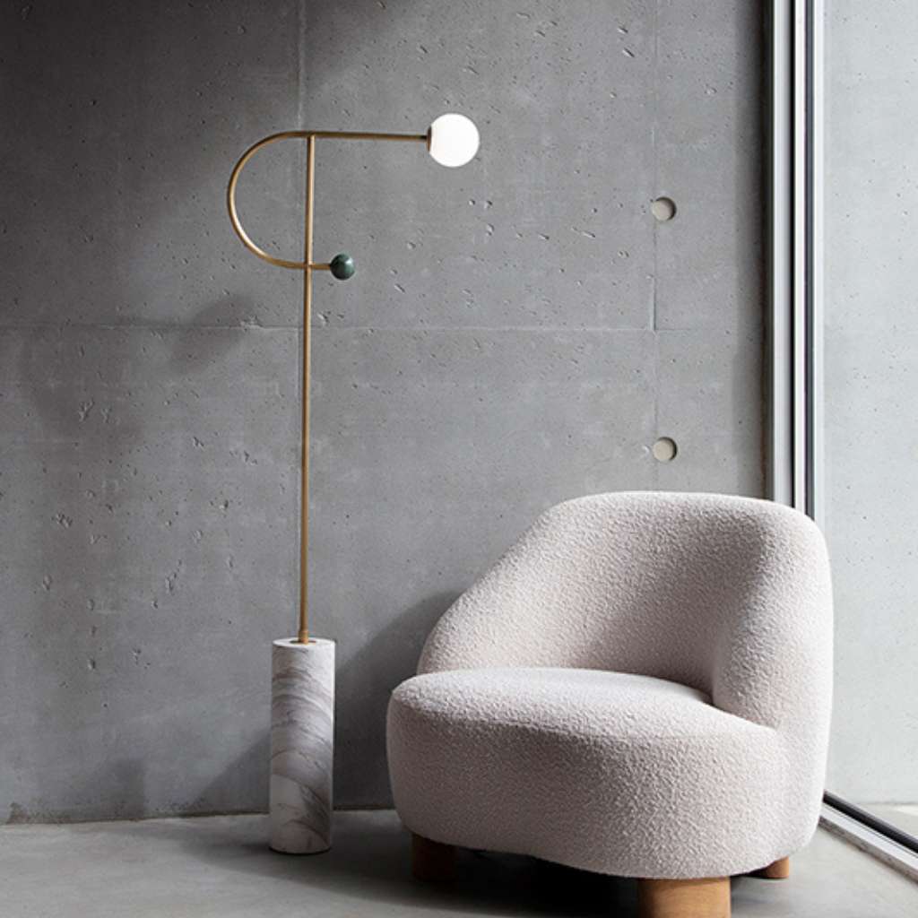 Square In Circle modern wall-mounted light with tubular design.