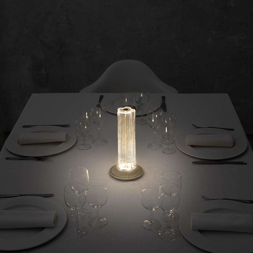 Vesoi glowing column table lamp set for elegant dining.