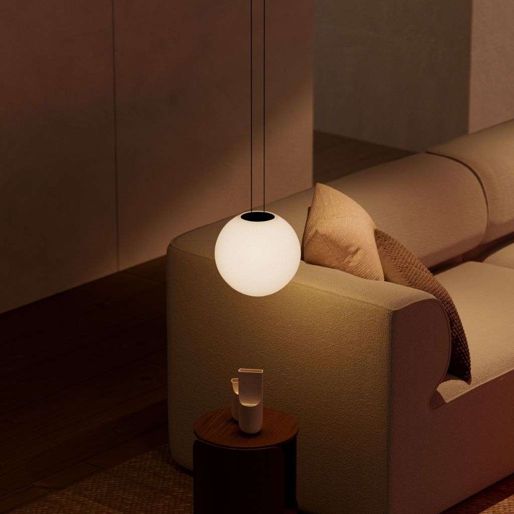 Vibia's minimalist globe pendant light elevating a sophisticated living space.