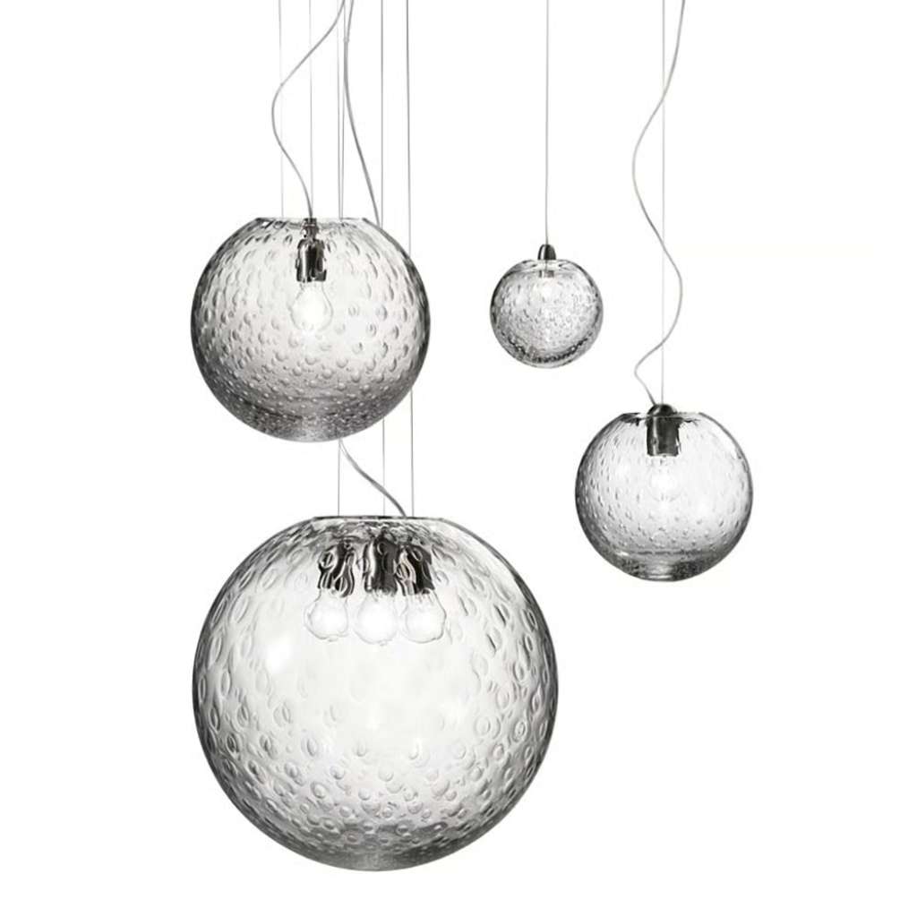 Elegant round pendant lights by Vistosi with textured glass for a refined, modern ambiance.
