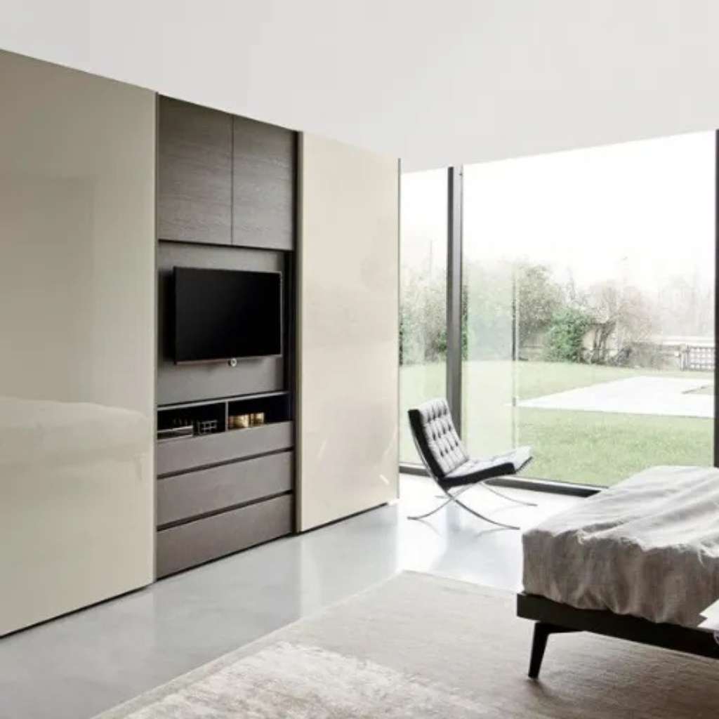 Elegant cream and brown glossy TV unit with hidden storage, adding luxury to a modern bedroom.