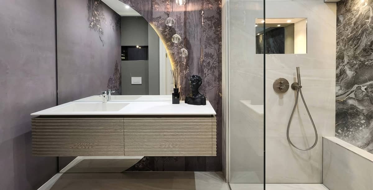Elegant bathroom with sleek vanity and shower area.