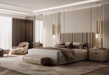Luxurious beige bedroom with a plush bed, modern lighting, and elegant armchair.