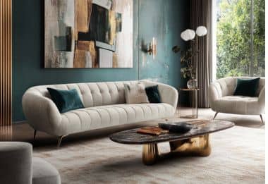 Contemporary white fabric sofa with artistic wall art and coffee table