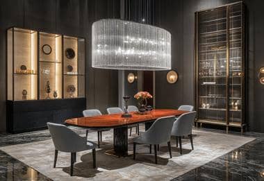 Elegant dining room with a crystal chandelier and modern wooden dining table.