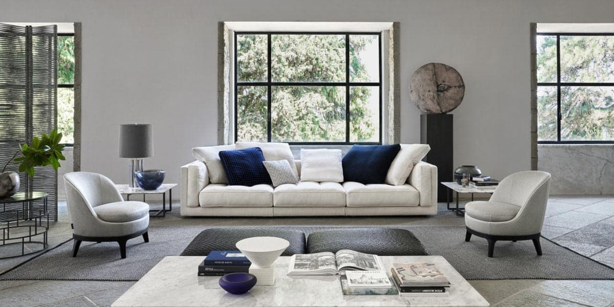 FCI London Flexform leather sofa: refined stitching, timeless Italian elegance.
