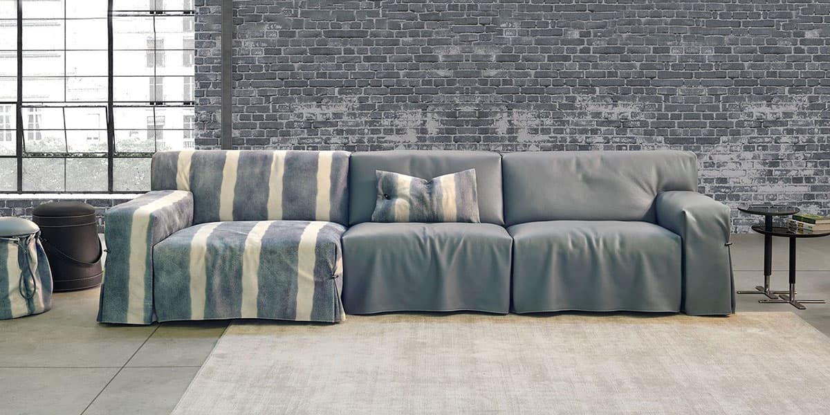 FCI London statement sofa with contrast piping; design-led focal point for living rooms.