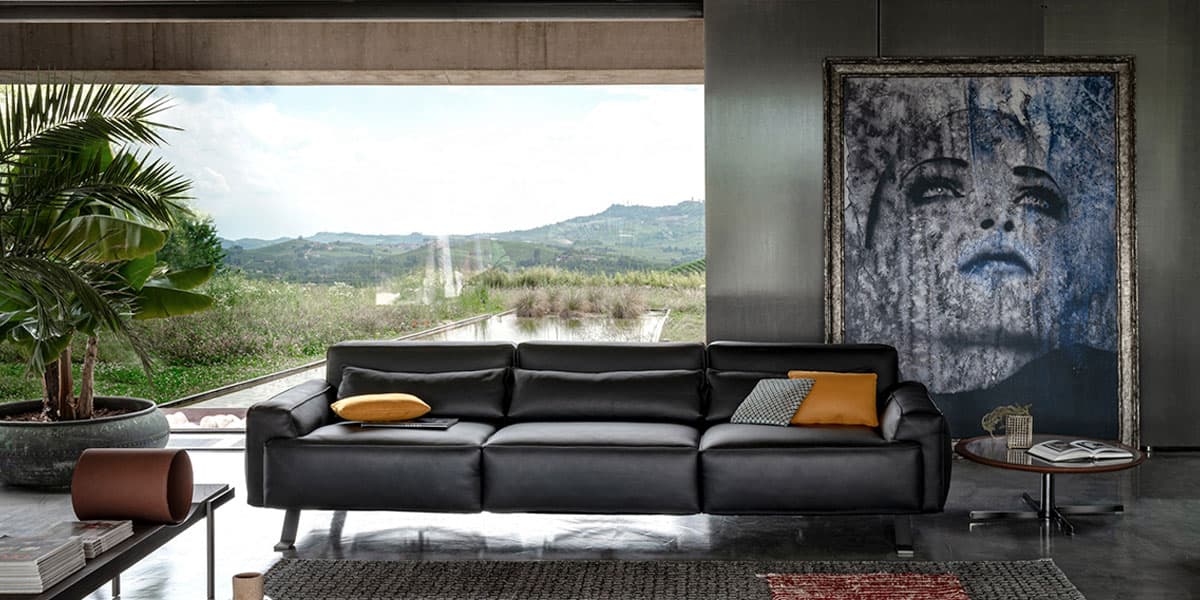 FCI London textured-fabric statement sofa with clean geometry for modern living rooms.