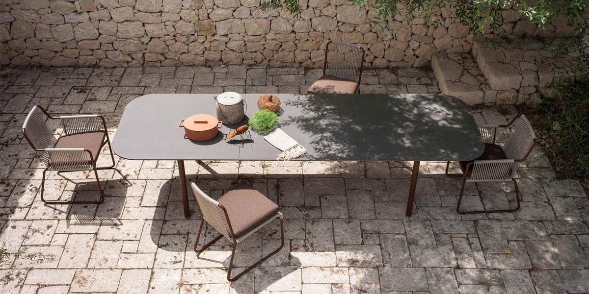 FCI London extended outdoor dining table for larger gatherings and alfresco meals.