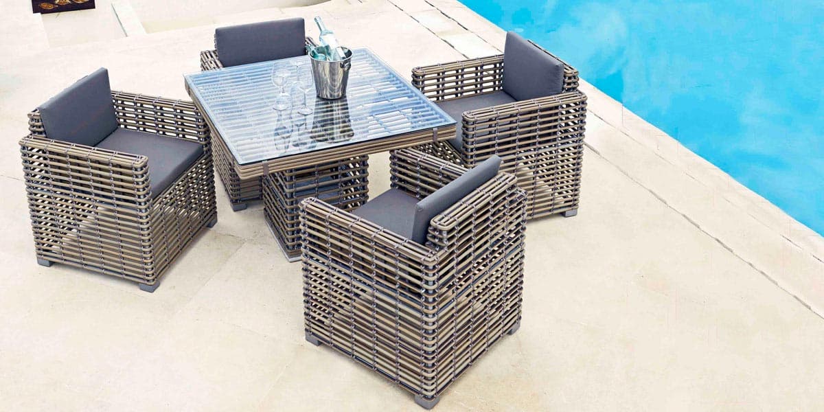 FCI London modern outdoor dining set: refined materials and clean lines for gardens.