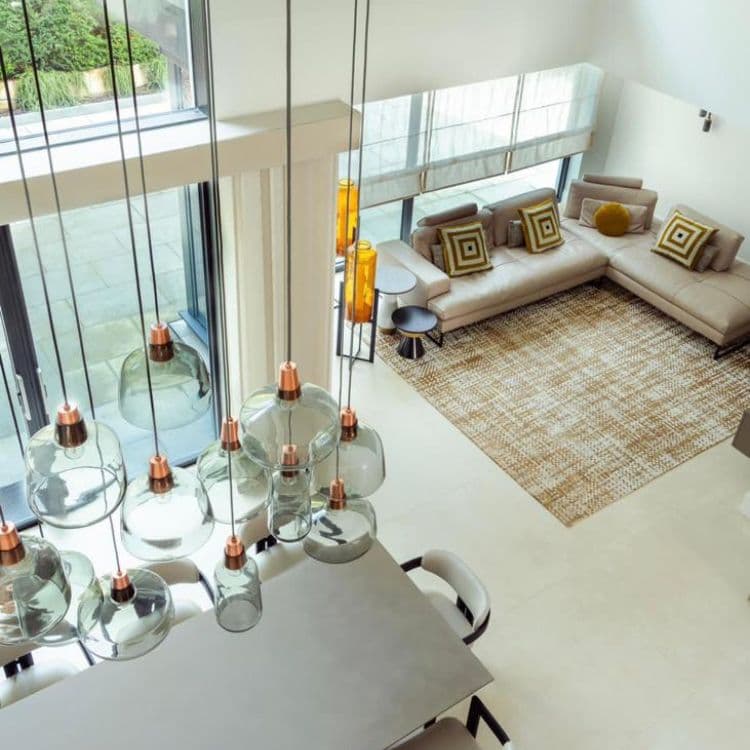 Second living room in Valley Road project with 3-seater sofa and armchairs