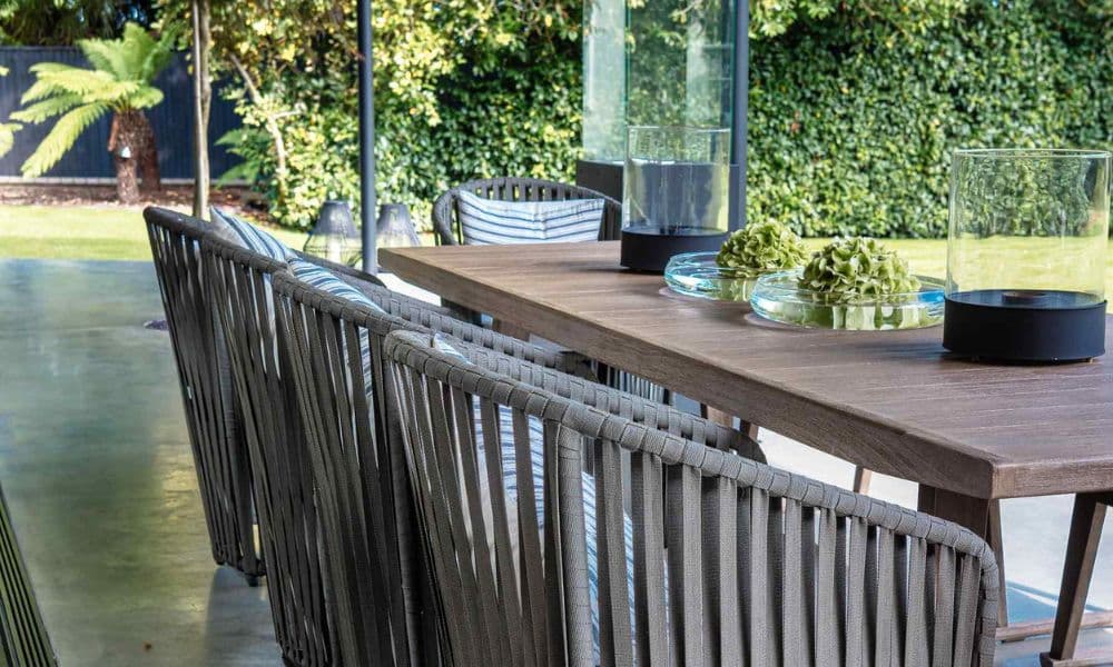 FCI London marble dining table decor tips: balanced place settings and elegant glassware.