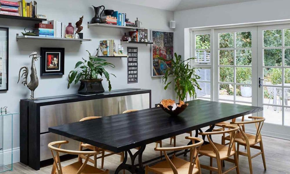 FCI London wood dining table styling with textured runner and ceramic accents.