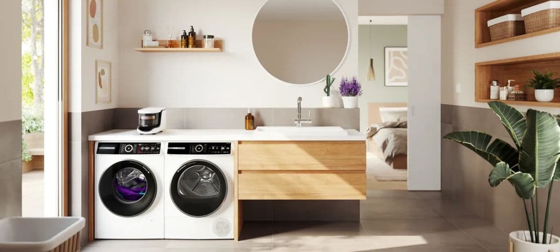 Bosch washing machine and dryer in a modern laundry room.