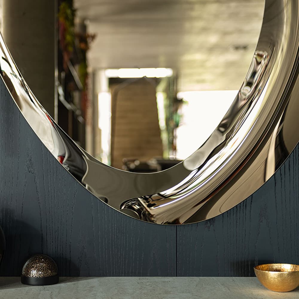 Side angle of Ascot Mirror showing its dynamic curved frame FCI London