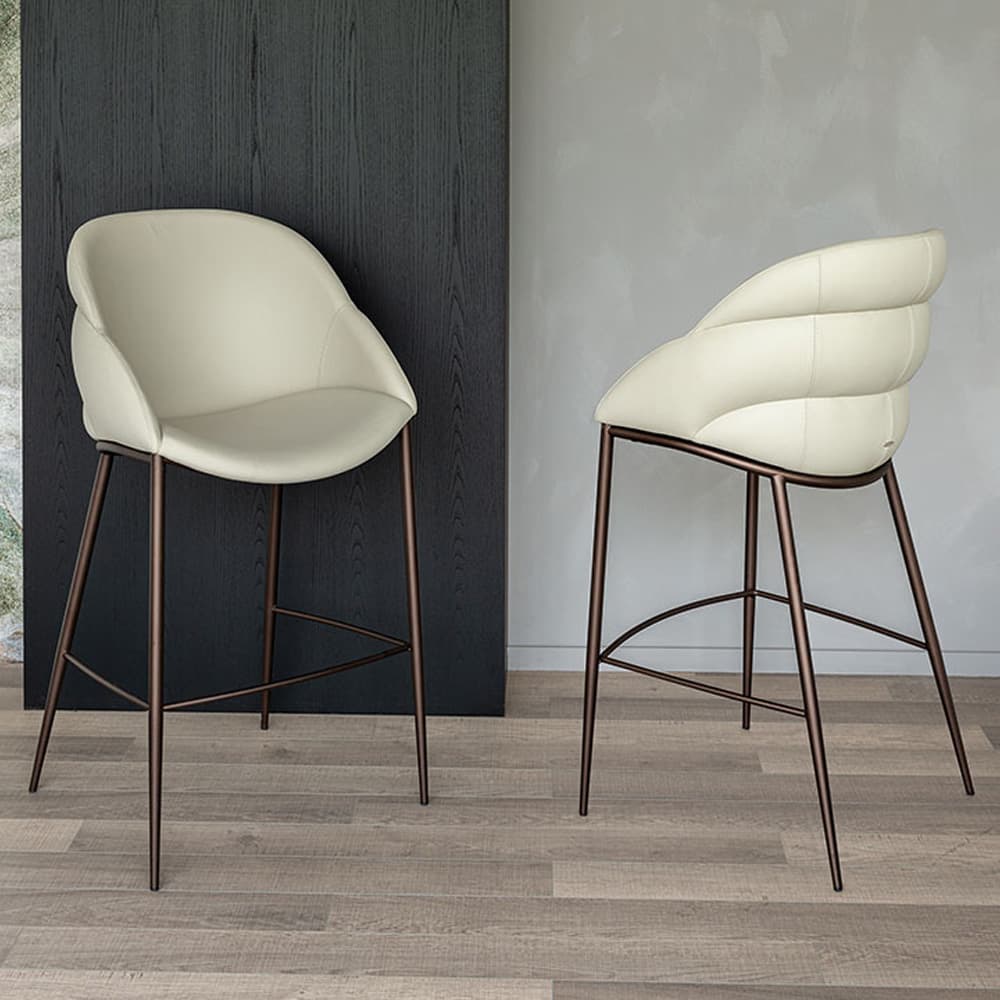 Camilla bar stool with a soft leather finish and refined metal frame from FCI London