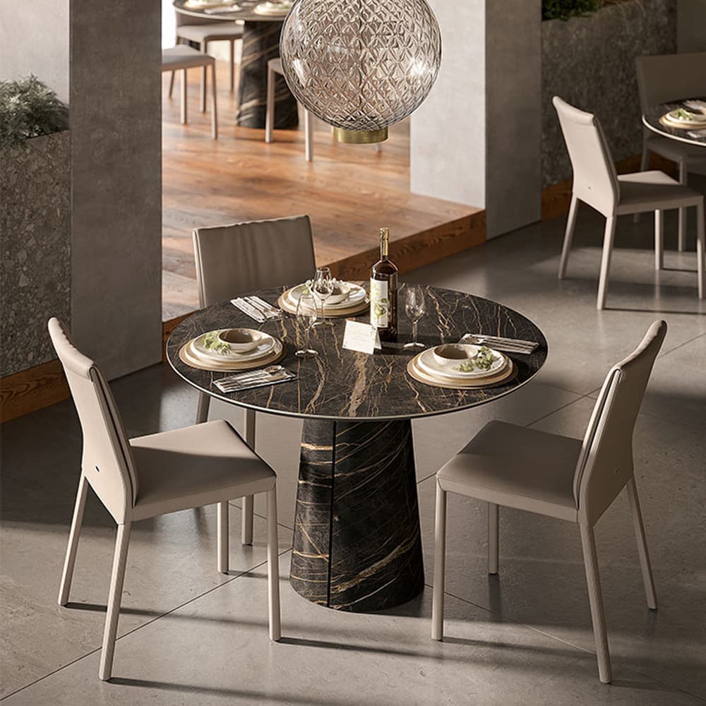 Side view of the Cuba Keramik Bistrot dining table showcasing its cylindrical base FCI London