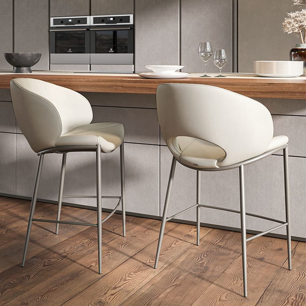 Side view of Miranda bar stool showing soft ripple seat design from FCI London