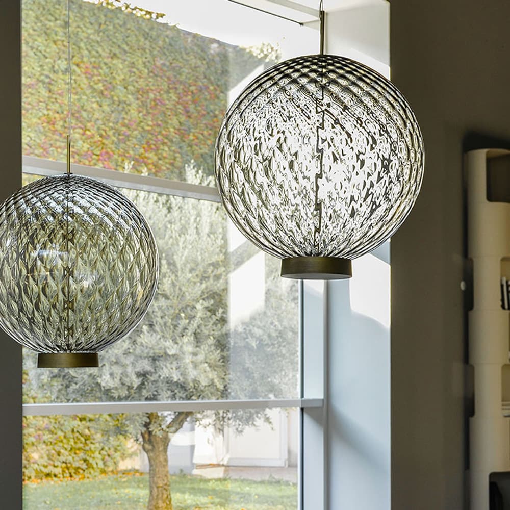 Close-up view of Ohay ceiling lamp showcasing the facetted smoked glass design from FCI London