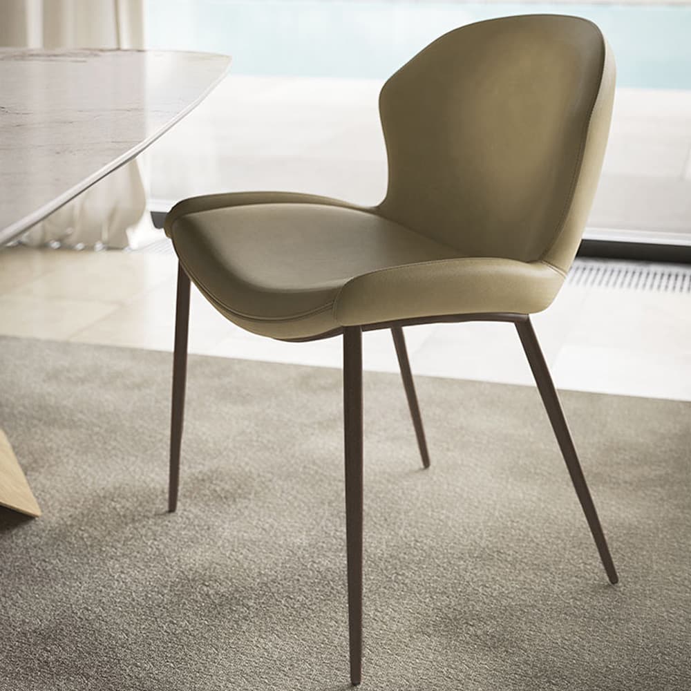 Side view of Rachel ML Swivel Chair showcasing curved backrest by Cattelan Italia
