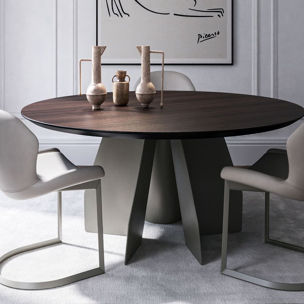 Close-up of Senator round dining table featuring a smooth walnut top by FCI London