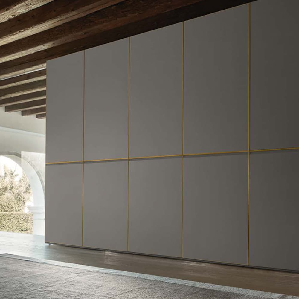 Hinged door wardrobe by Logo at FCI London. Sleek and spacious design for organized storage.