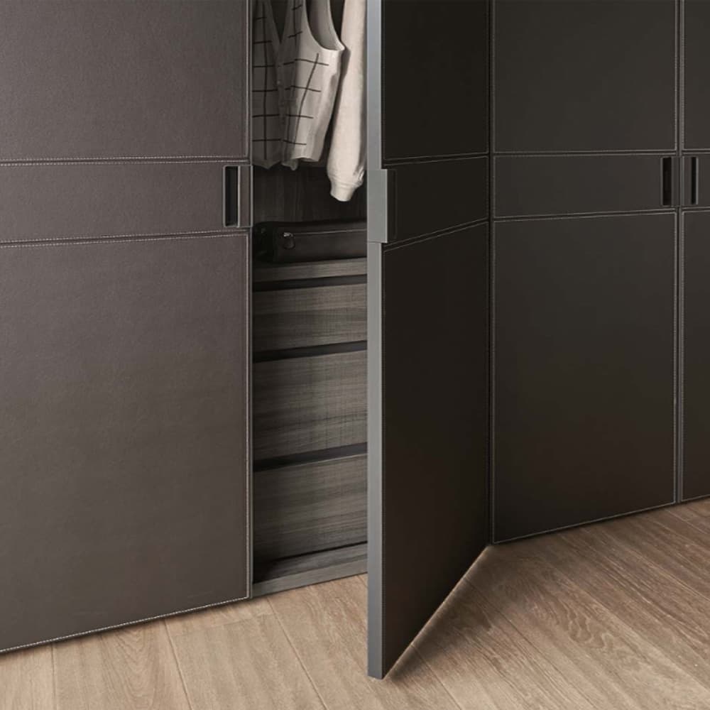 Hinged door wardrobe by Logo at FCI London. Modern design with ample and organized storage.