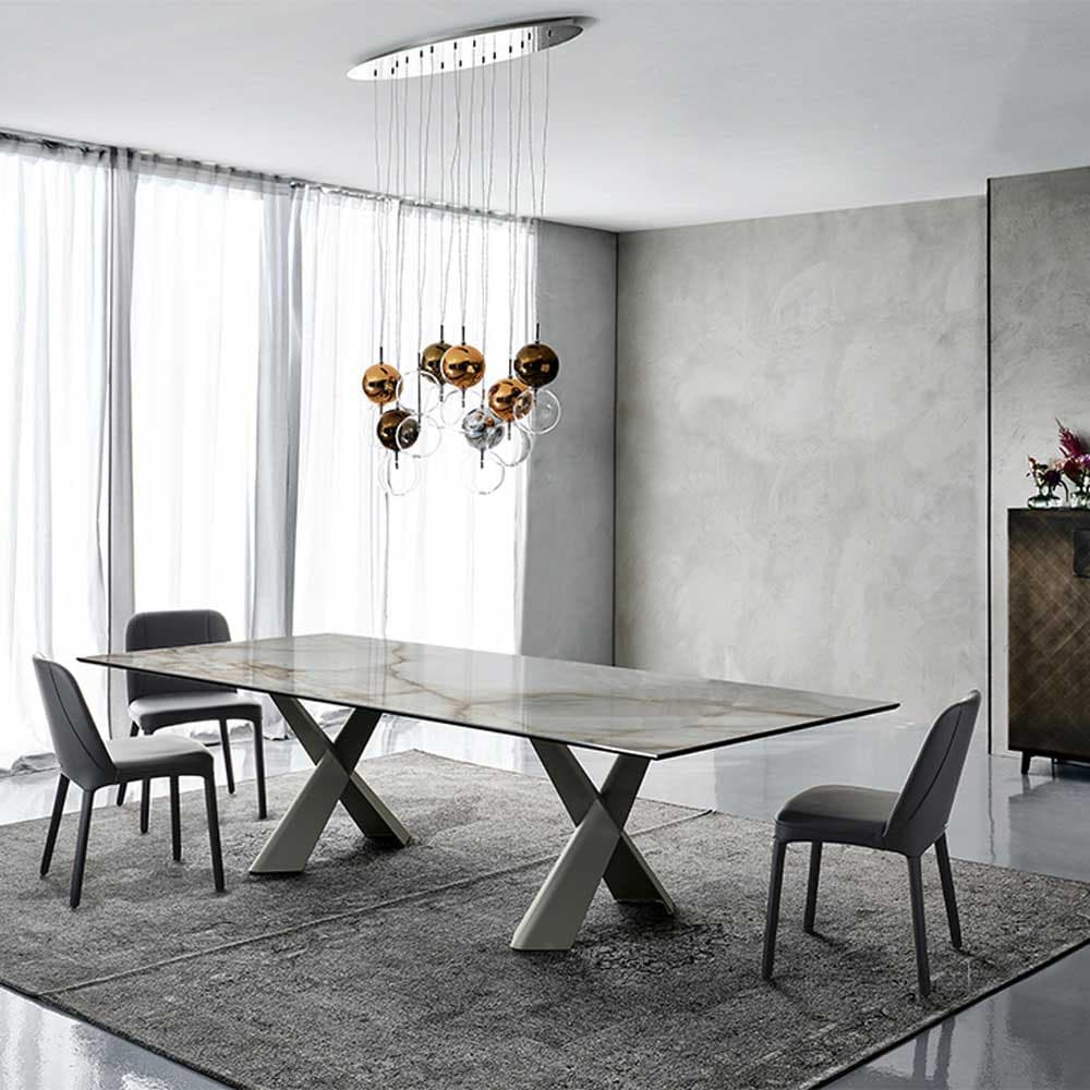 Full view of Mad Max Keramik dining table in a sophisticated setting, from FCI London
