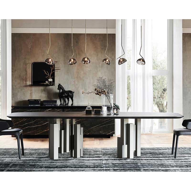 Elegant dining table with a wooden finish and modern design available at FCI London.