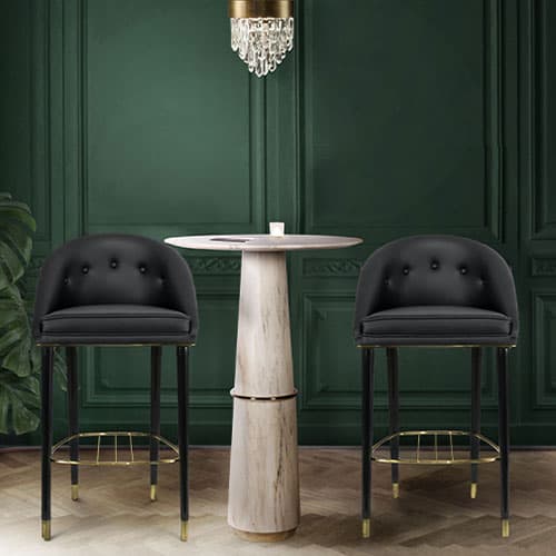 Malay Bar Stool by Brabbu with black leather and aged brass accents for theatrical luxury