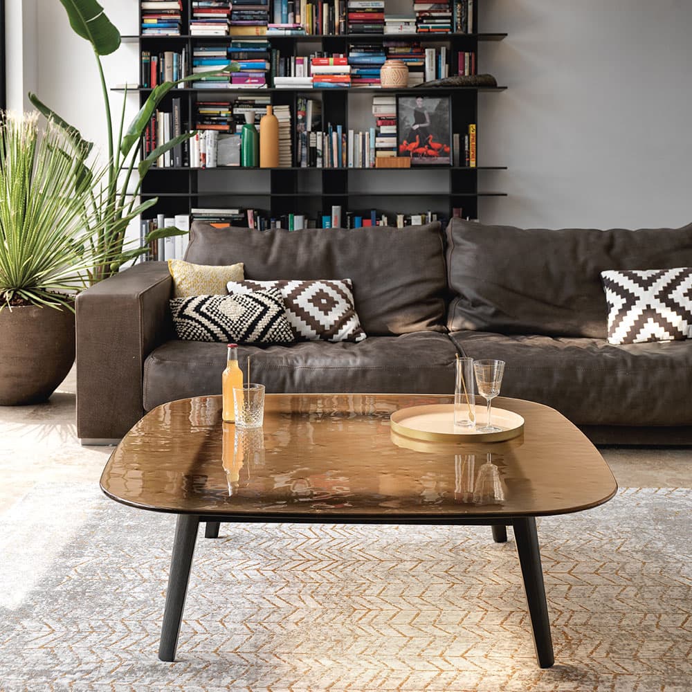 Magma Coffee Table by Fiam Italia with sculptural fused glass top and minimalist wooden tapered legs