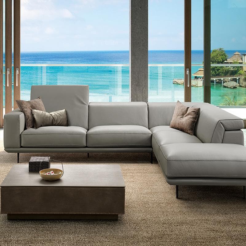 Denny modular leather sofa by Gamma & Dandy featuring adjustable headrest and contemporary design