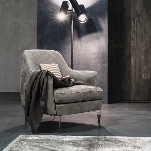 Boheme armchair by Cierre featuring tufted stitching and ultrasoft cushioning for comfort