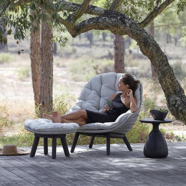 Sandua Outdoor Lounge Chair by Manutti, woven shell lounge chair on wooden base