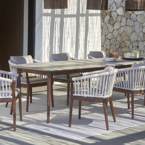 Legna outdoor furniture table by Skyline Design with all-weather rattan detailing
