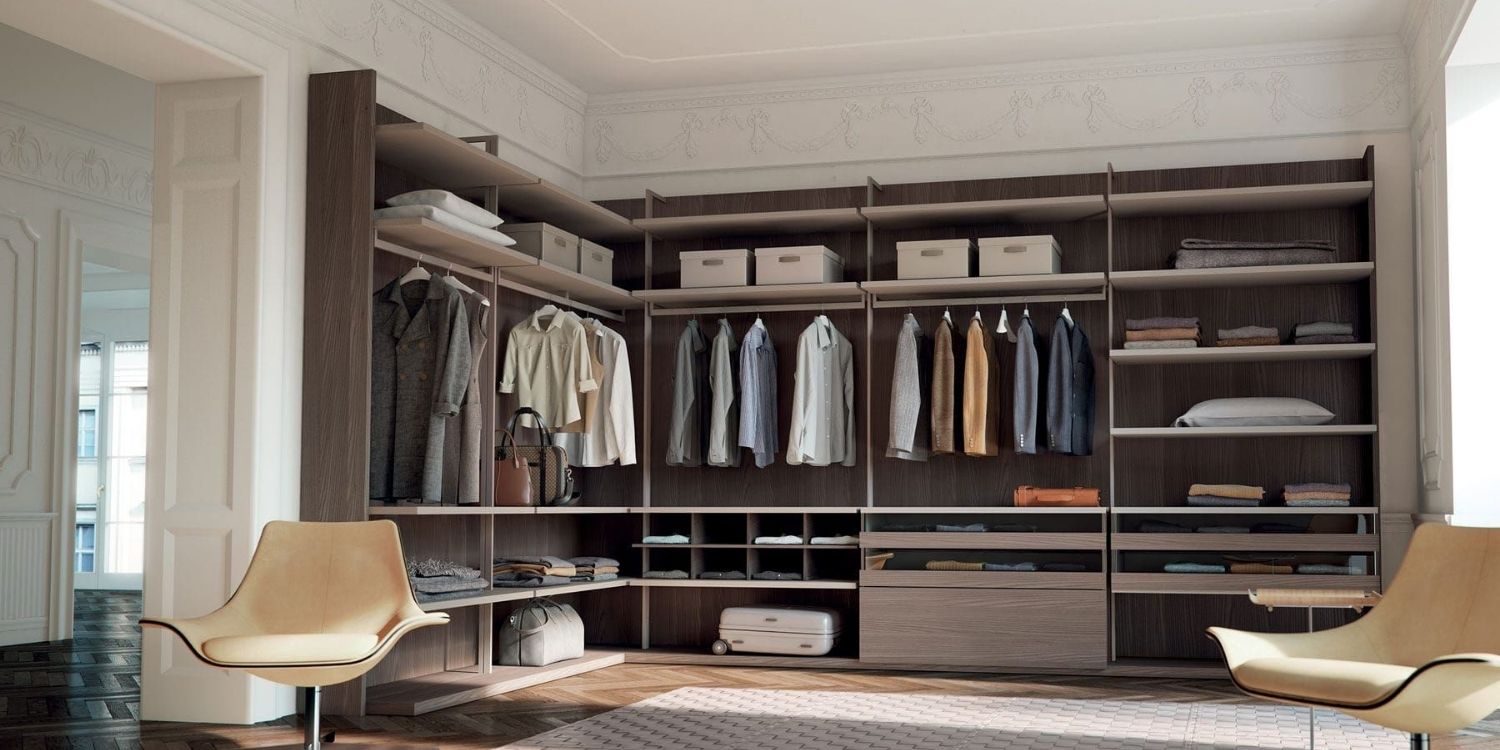  Stylish walk-in wardrobe by Porada with spacious storage solutions and modern elegance.