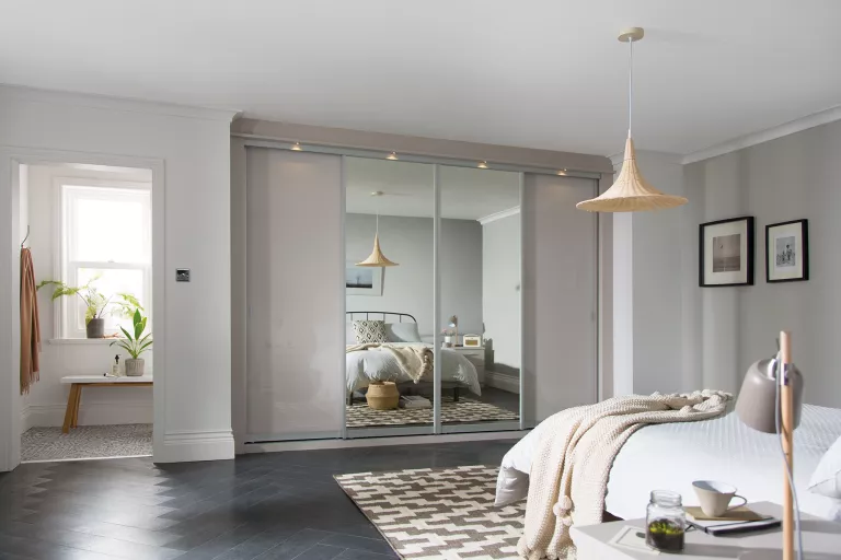 FCI London: modernise built-in wardrobes with sleek mirrored sliding doors.