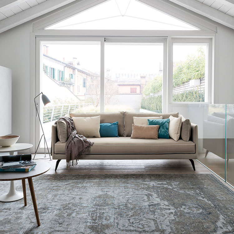 Contemporary Italian leather sofa in a modern London living room setting