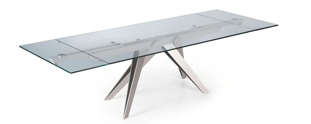 FCI London Naos Somnia dining table with sculptural base; modern luxury furniture.