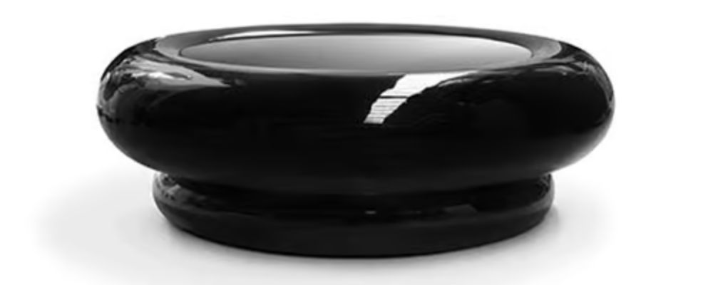 Shinto Round Coffee Table by Brabbu featuring Japanese-inspired sculptural design with dramatic presence