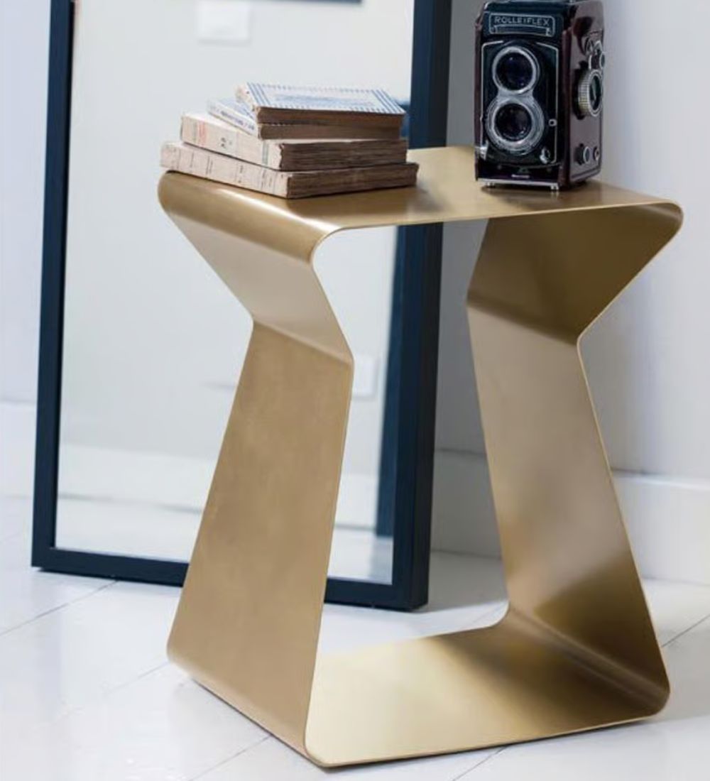 Kito Coffee Table by Bontempi Casa featuring sleek vase-like folded steel silhouette in gold