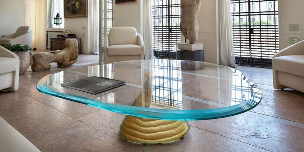 Murano Coffee Table by Reflex Angelo showcasing Venetian glassmaking traditions with organic flowing forms and amber gold base