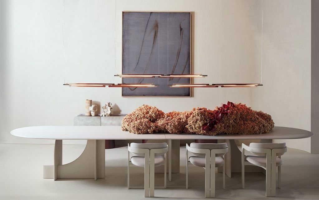 Complete Ethereal collection dining room setup demonstrating proper spacing and lighting design principles