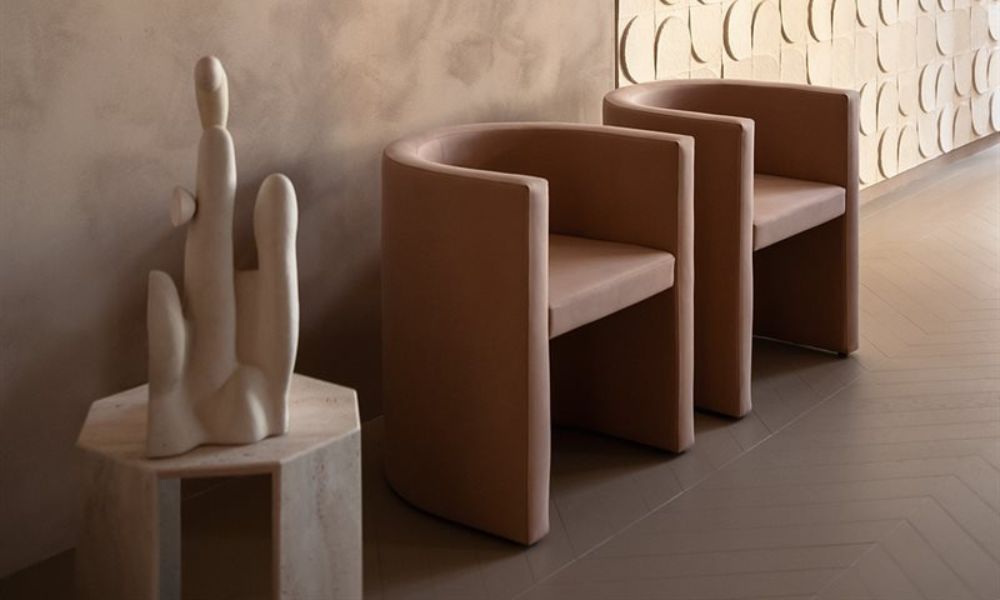 H2O dining chairs with full upholstery in contemporary luxury dining setting by Gallotti & Radice