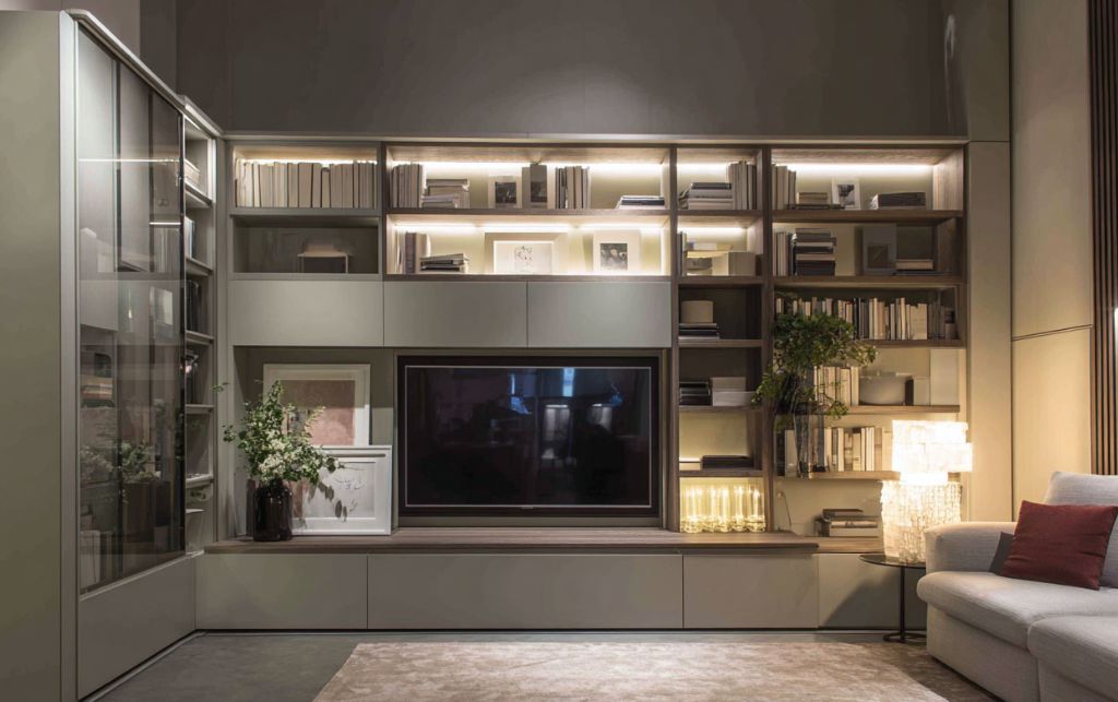 Vertical zoning showing storage and display integration in corner unit