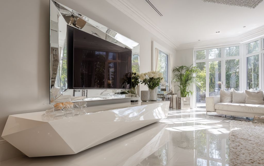 Luxury home interior with high gloss TV unit installation