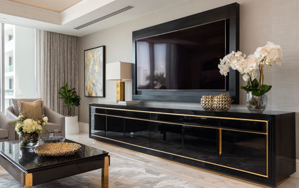 Black wood TV unit creating depth in contemporary interior