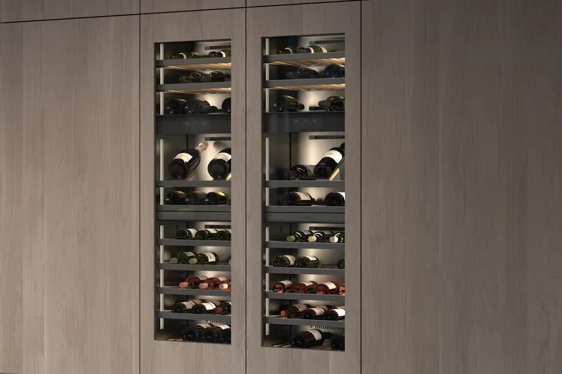 Stylish Gaggenau wine cabinet with LED lighting and custom shelving for organized wine collection in luxury London home